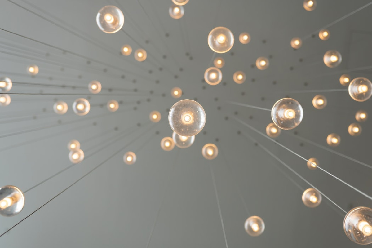 image of light bulbs hanging from the ceiling